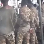 Soldiers awaiting military court proceedings.