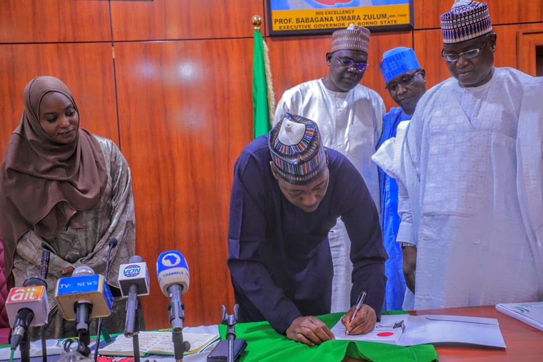 Governor Babagana Umara Zulum (2nd left) signing into law nine bills passed by the Borno State House of Assembly on Wednesday in Maiduguri. By the Governor’s left is speaker of the assembly, AbdulKarim Lawan.