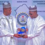 Governor Babagana Umara Zulum presenting a souvenir to Nigeria’s minister of health, Professor Mohammed Ali Pate during the minister’s visit to Government House, Maiduguri on Friday.