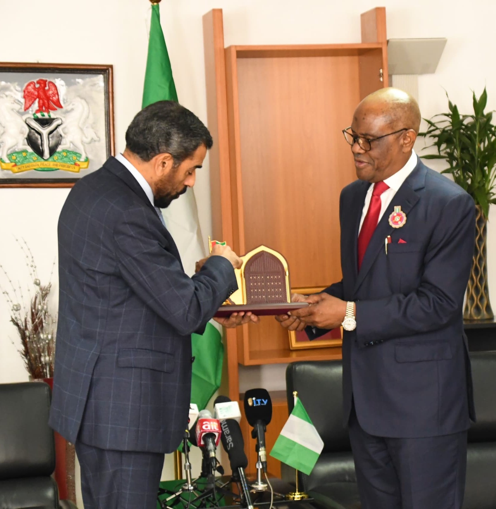 UAE Ambassador to Nigeria, HE Salem Saeed Al Shamsi presenting a gift to the FCT Minister, Barrister Nyesom Wike during the envoy's visit to the Minister, on Monday